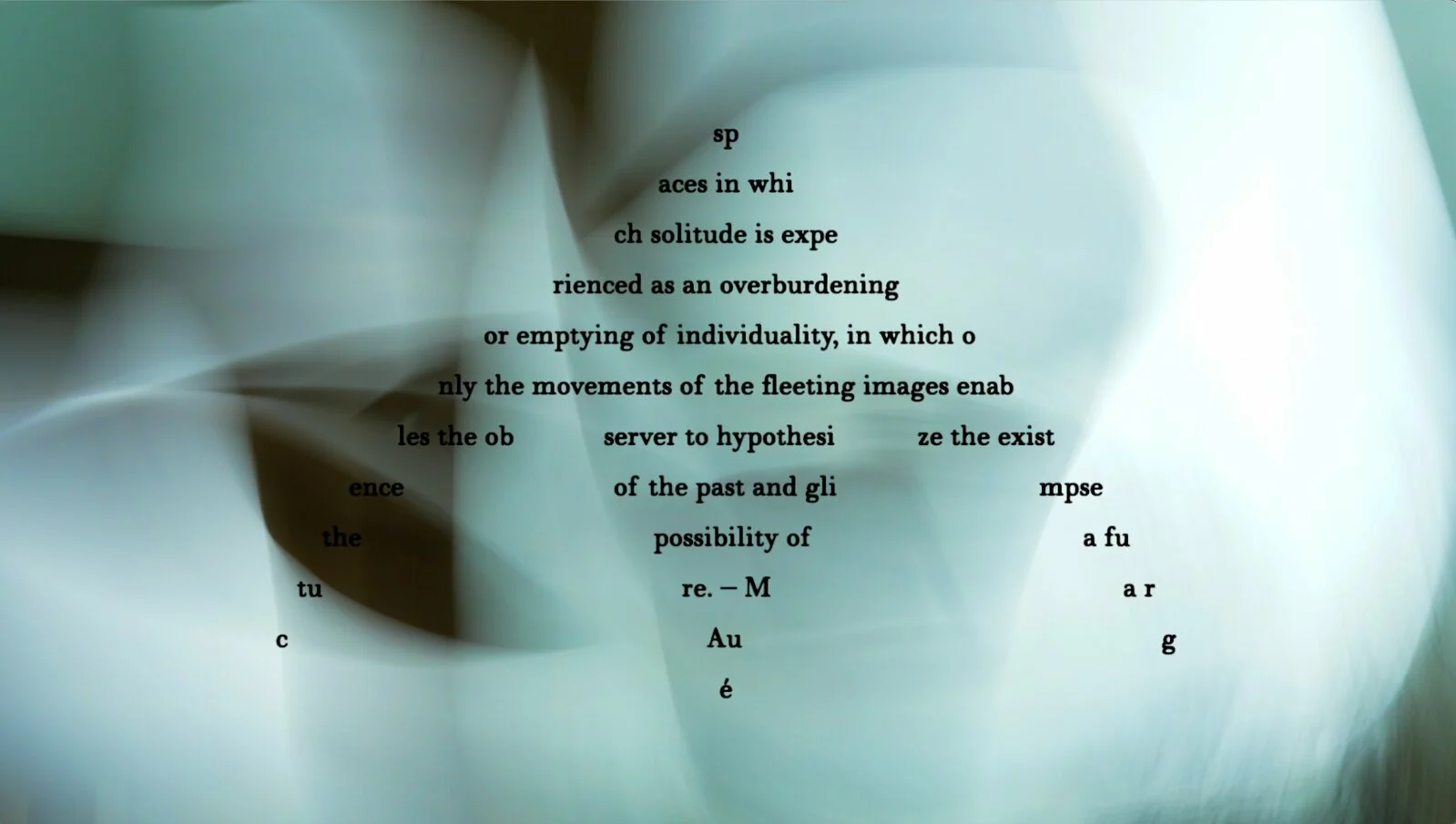 Still image of black typed words partially obstructed by abstract shapes.