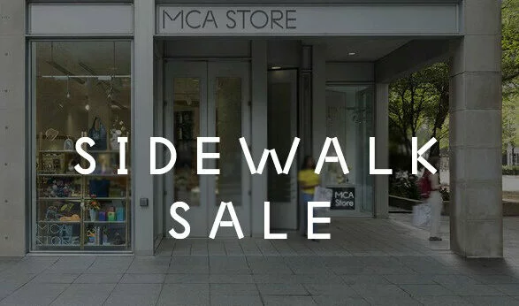 The MCA Store from the exterior with the words Sidewalk Sale, August 19, 2023, 12 pm–4 pm. Shop books and more over it.
