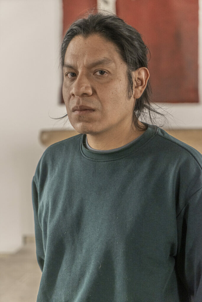 Photograph of Noe Martinez looking at the camera.