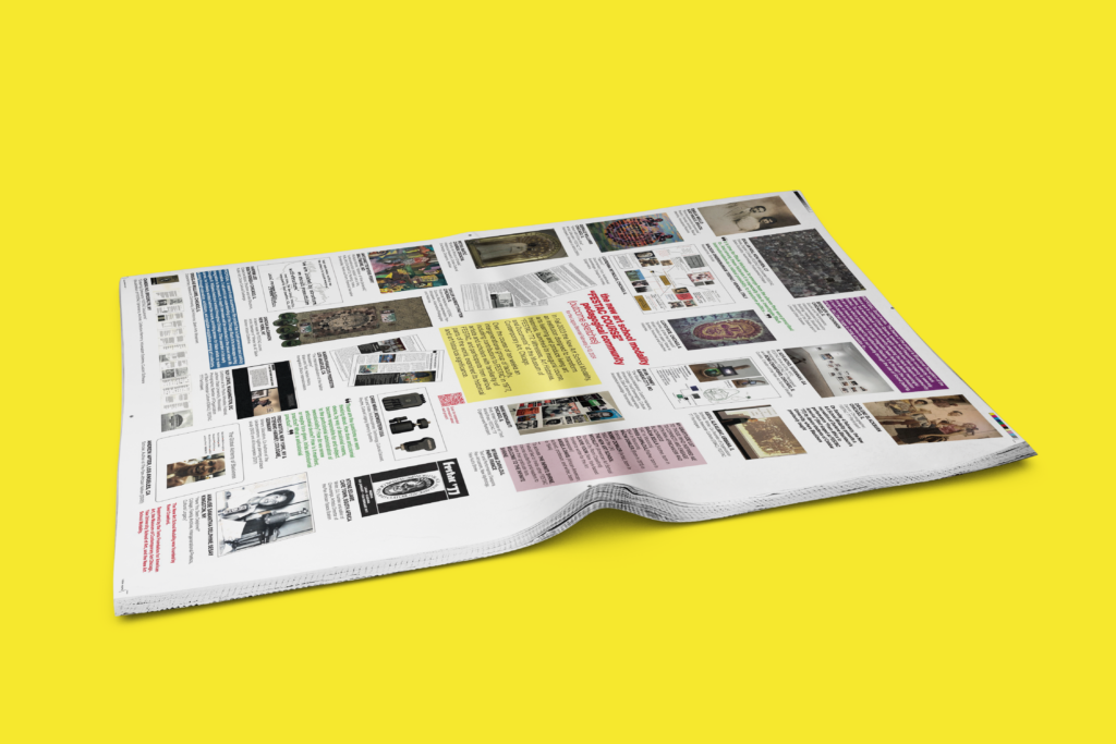 A side view of a newspaper against a yellow background
