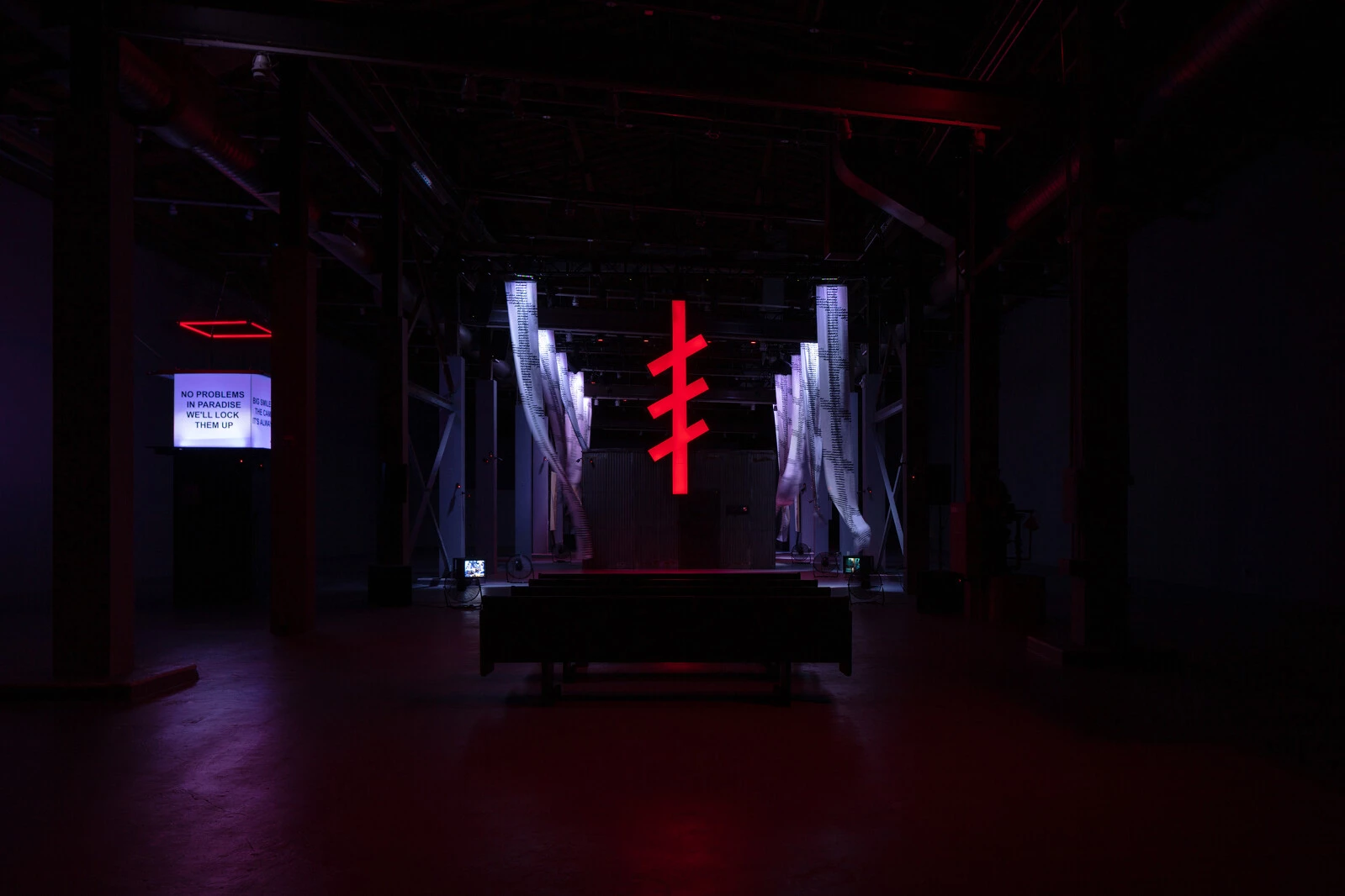 Nadya Tolokonnikova, <em>POLICE STATE</em>, 2025. Performance documentation from The Geffen Contemporary at MOCA. Photo: Zak Kelley. Courtesy of The Museum of Contemporary Art (MOCA). 2025/10/2.-Lead-Image-Outside-of-Cell-by-Zak-Kelley.jpg 