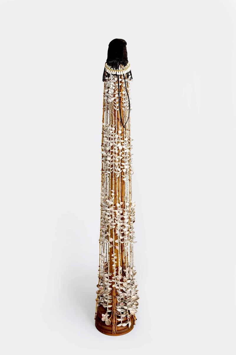 Kenzi Shiokava, <em>Untitled (Shaman Series)</em>, 2000. Shells, leather, and wood; 74 × 12 × 12 in. (188 × 30.5 × 30.5 cm). Courtesy the Estate of Kenzi Shiokava and Nonaka-Hill, Los Angeles & Kyoto. Photo: Taka Nonaka-Hill. 2025/10/DSC5079.jpg